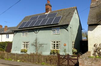 Timber-framed house with solar panels